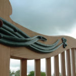 sculptural metalwork strap gate hinge