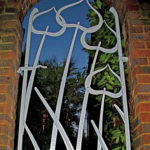 blacksmith forged contemporary catalpa pedestrian gate