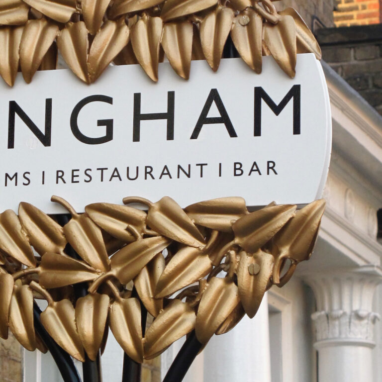 Bespoke metal signs with forged laurel leaves for the Bingham hotel in West London