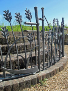 sculptural forged wheat railing