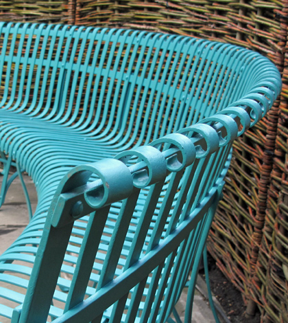 curved wrought iron bench