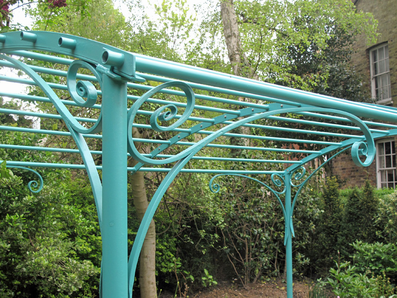 green-pergola-scroll-detail