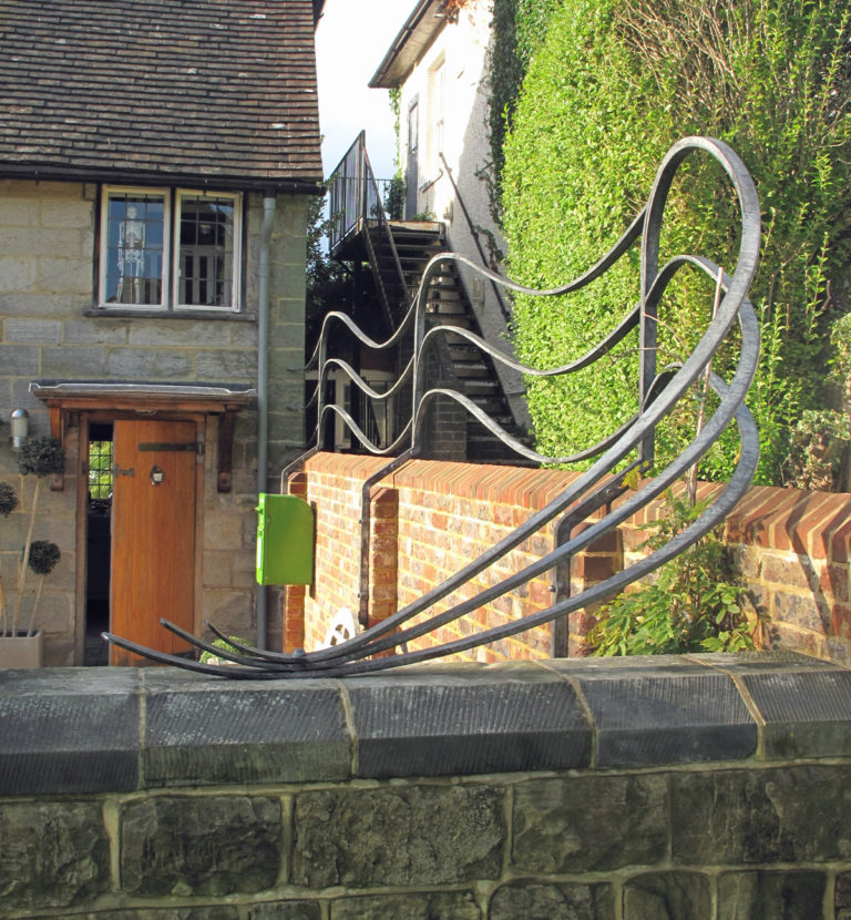 sculptural contemporary metal railing trellis