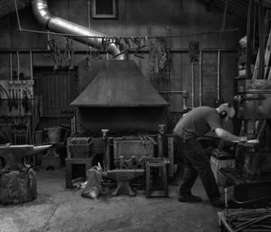 Blacksmith James Price working in his Sussex forge