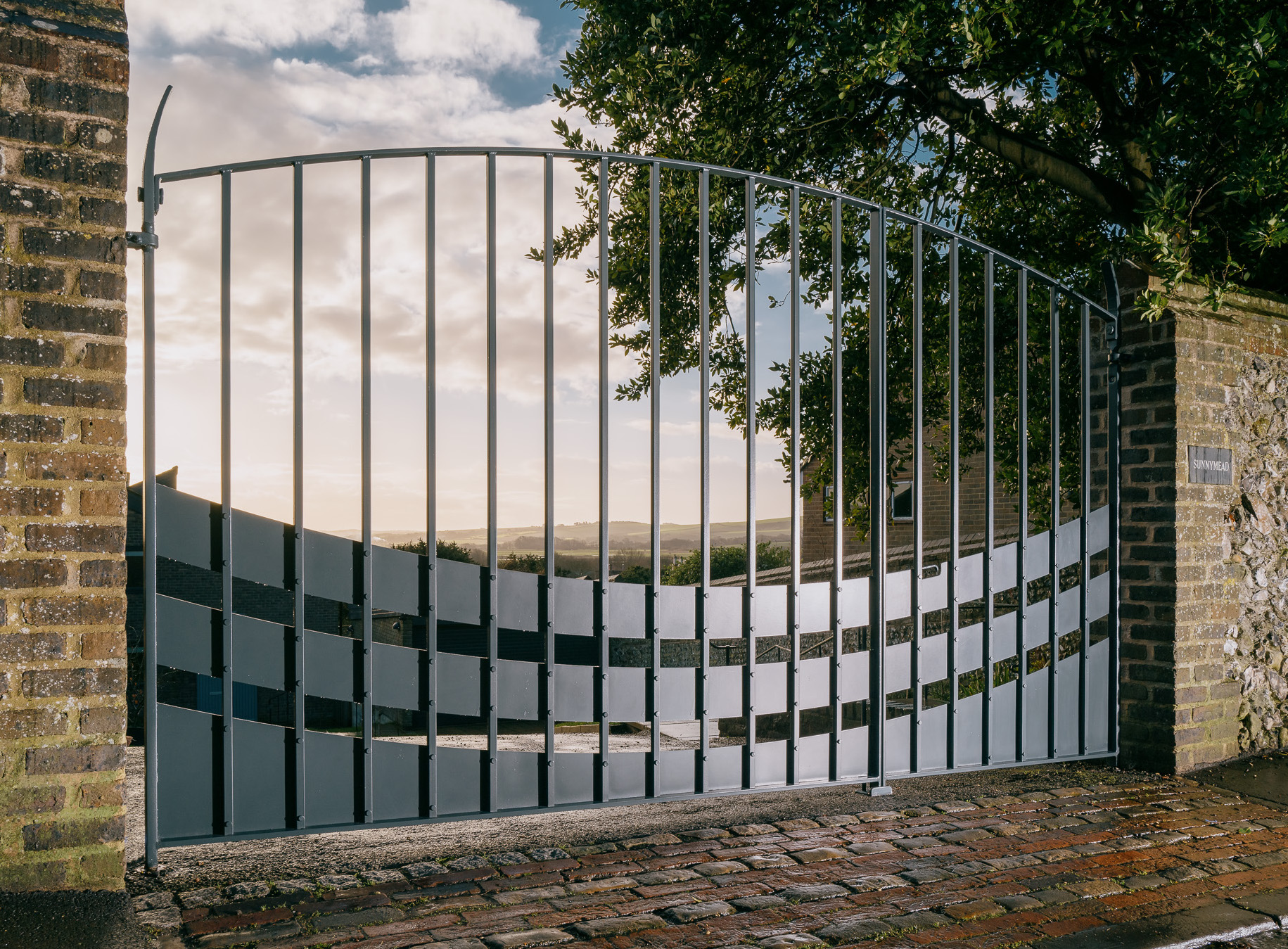 Plate-entrance-gates-ironwork-driveway-gate