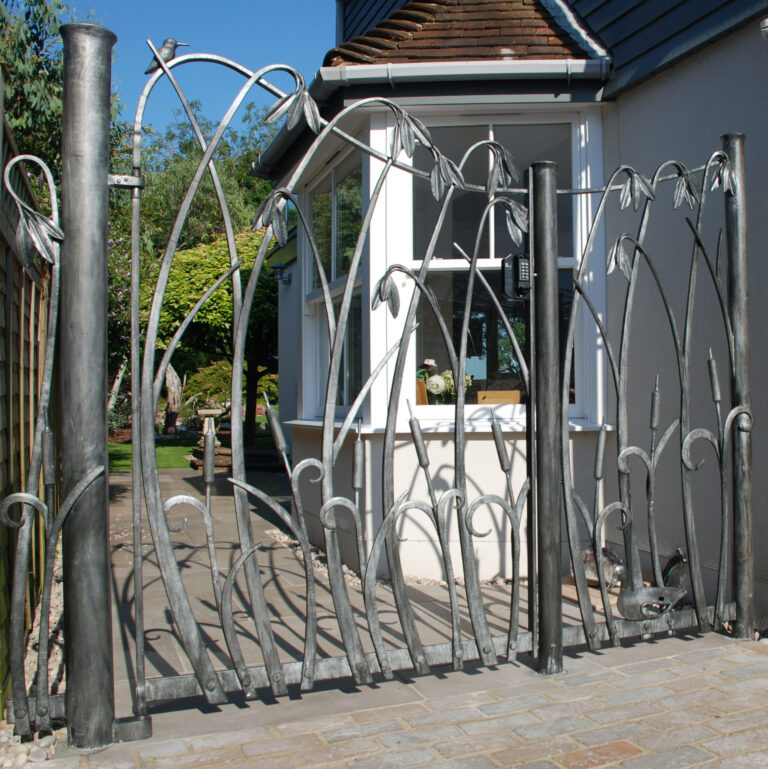 Plant inspired gates with hand forged iron reeds and willows bu sussex Blacksmith James Price.