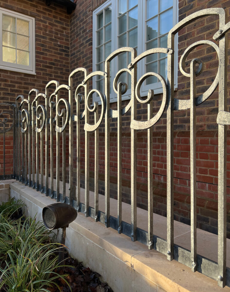 Sculptural iron railings for a sussex garden
