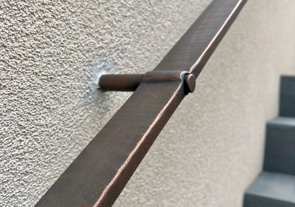 Bronze edge handrail