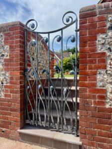 Flint-gate-garden-forged-blacksmith-gates-patinated