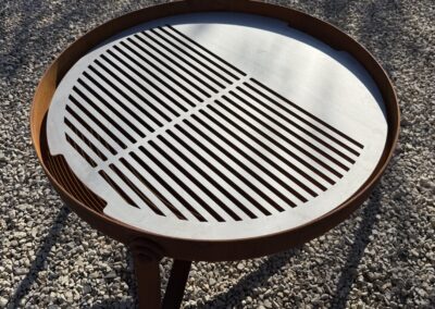 Bespoke garden fire bowl with a custom stainless steel grill