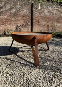 Bespoke fire bowl in a contemporary design with a rusted oxide finish