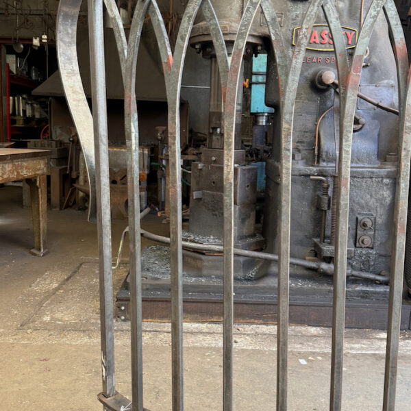 Gothic arch balustrade in forged wrought iron for a sussex garden
