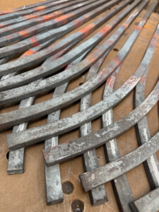 fire welded uprights used in a gothic arch railing and balustrade