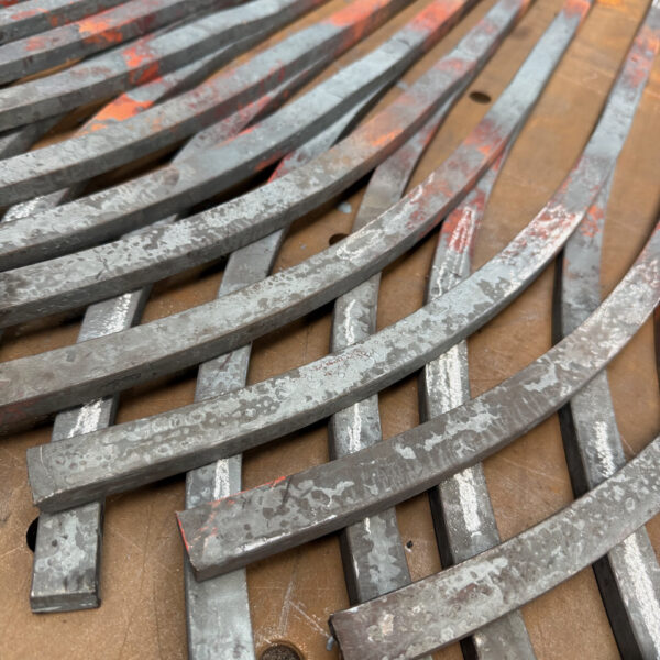 fire welded uprights used in a gothic arch railing and balustrade