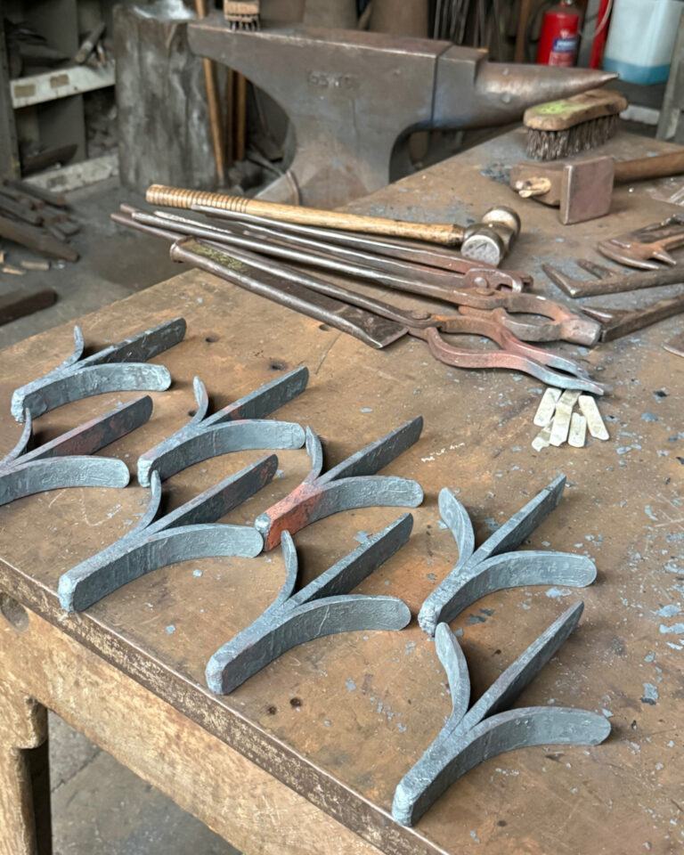 hand forged gate components for bespoke swimming pool gates for a sussex garden