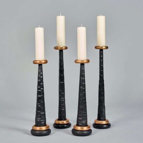 modern bronze and forged iron candlesticks in a textured finish